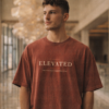 Elevated snow-washed tee worn by a male model — exact print