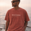 Blessed snow-washed tee worn by a male model — exact print
